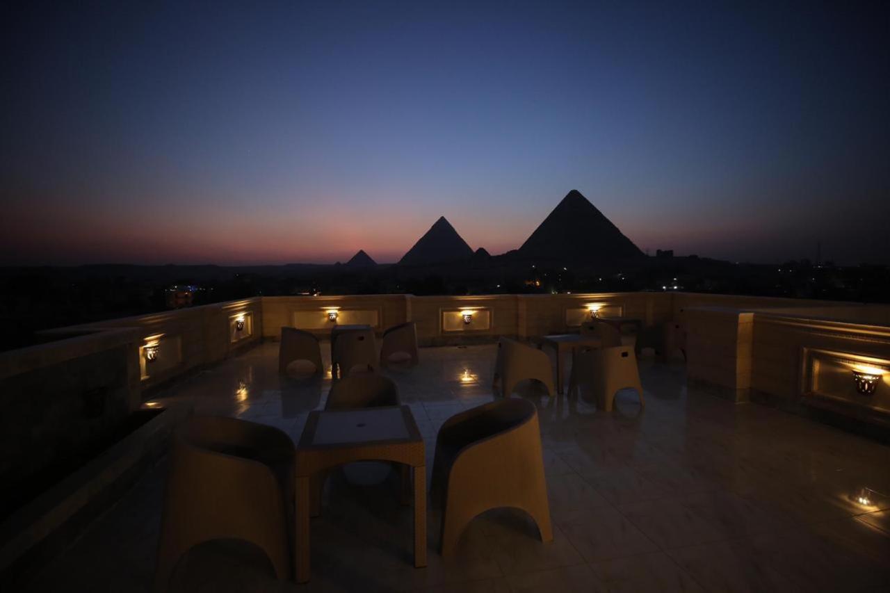 Готель Hussien Lotus Pyramids View Каїр Екстер'єр фото